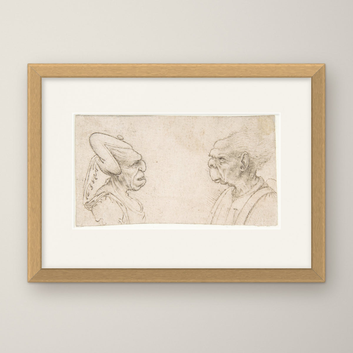 A Grotesque Couple – in an oak frame