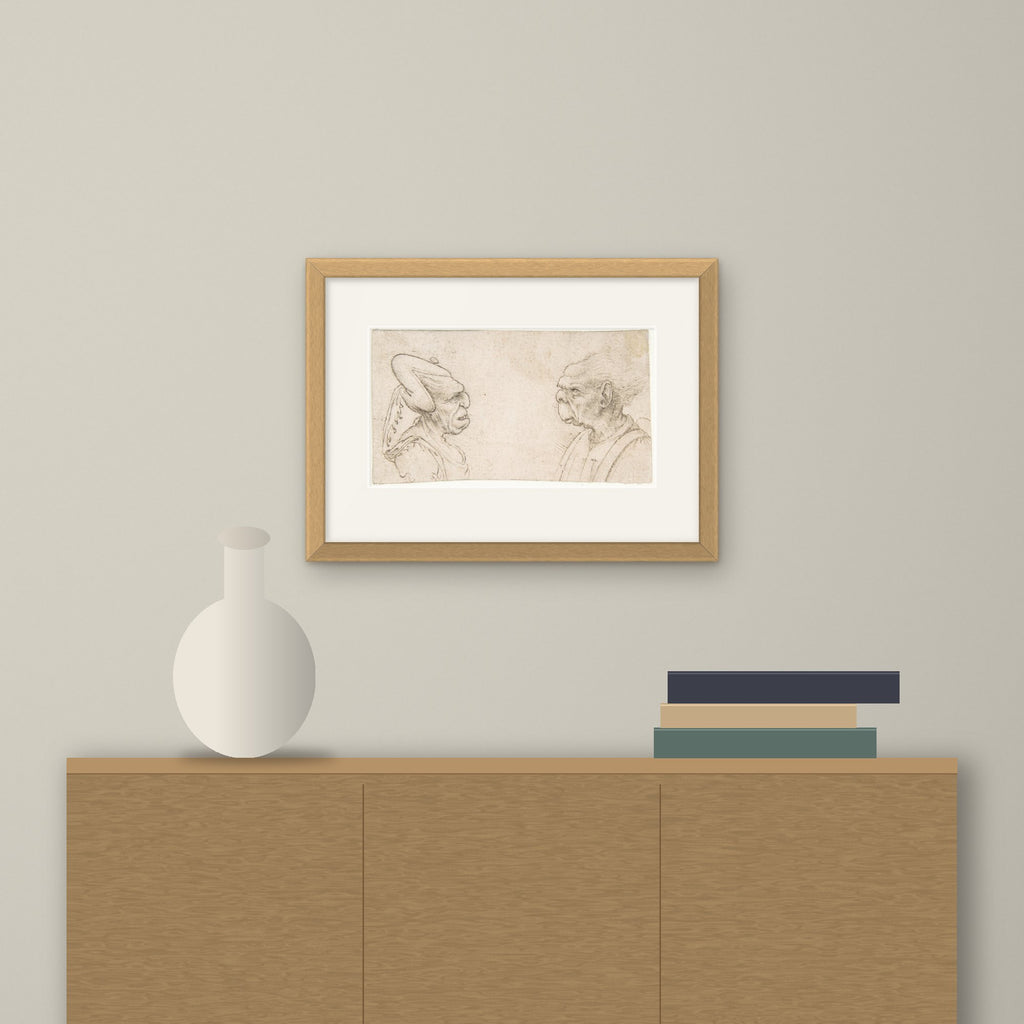 A Grotesque Couple – framed on a wall above a sideboard