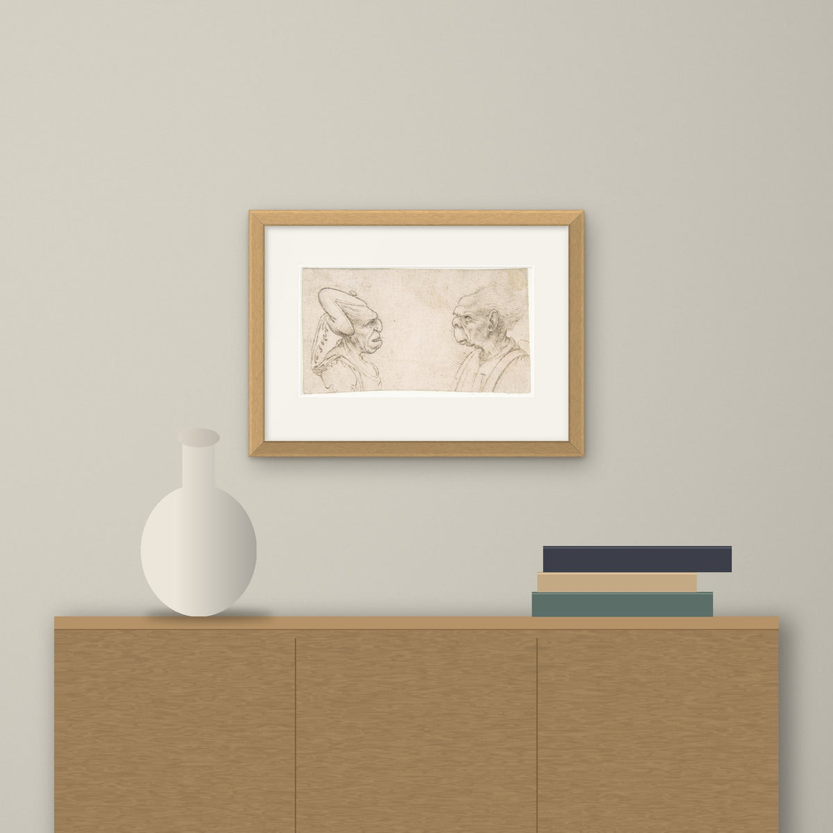 A Grotesque Couple – framed on a wall above a sideboard