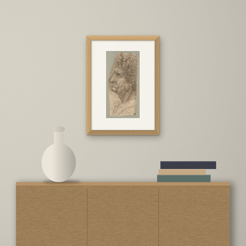 Head of a Man in Profile – framed on a wall above a sideboard