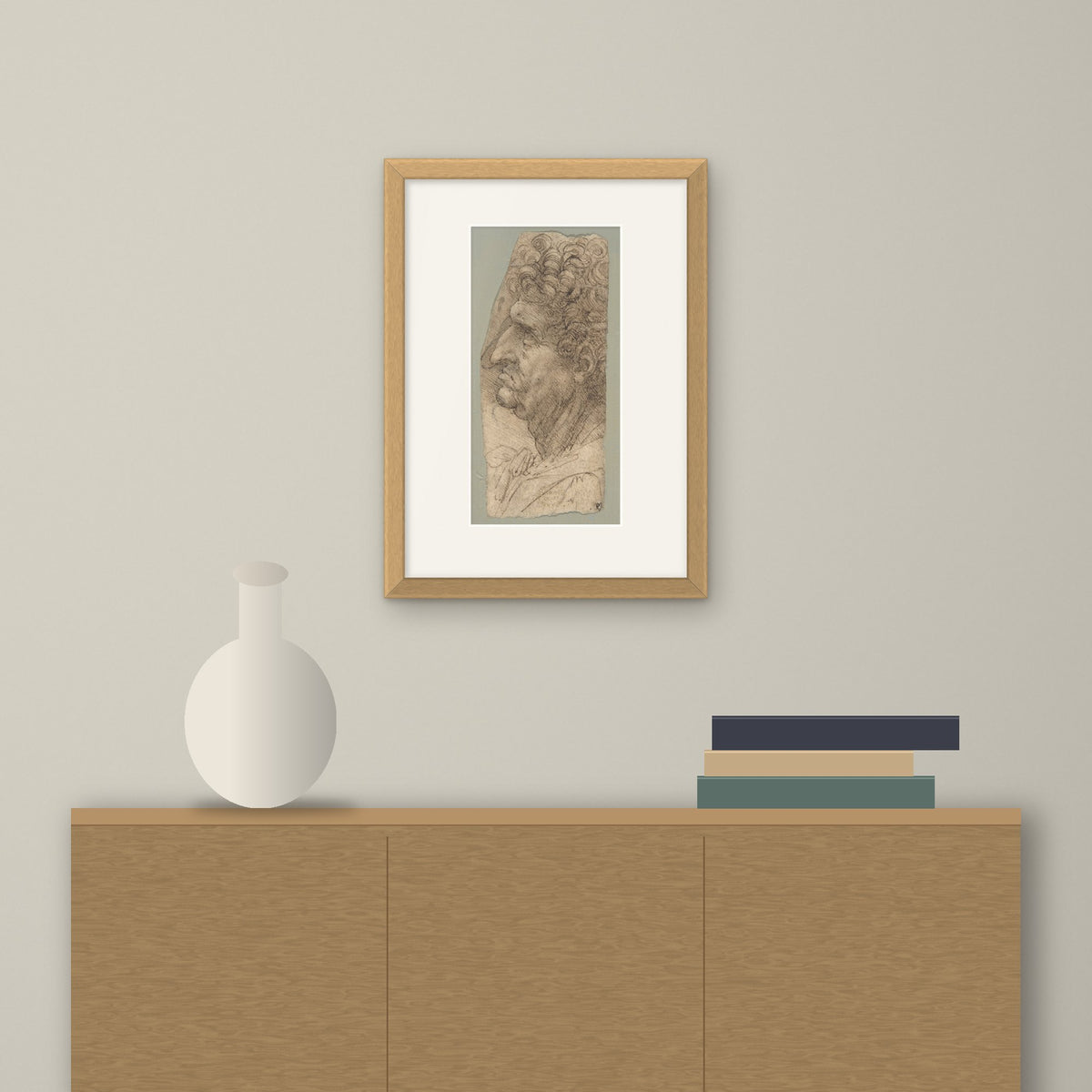 Head of a Man in Profile – framed on a wall above a sideboard