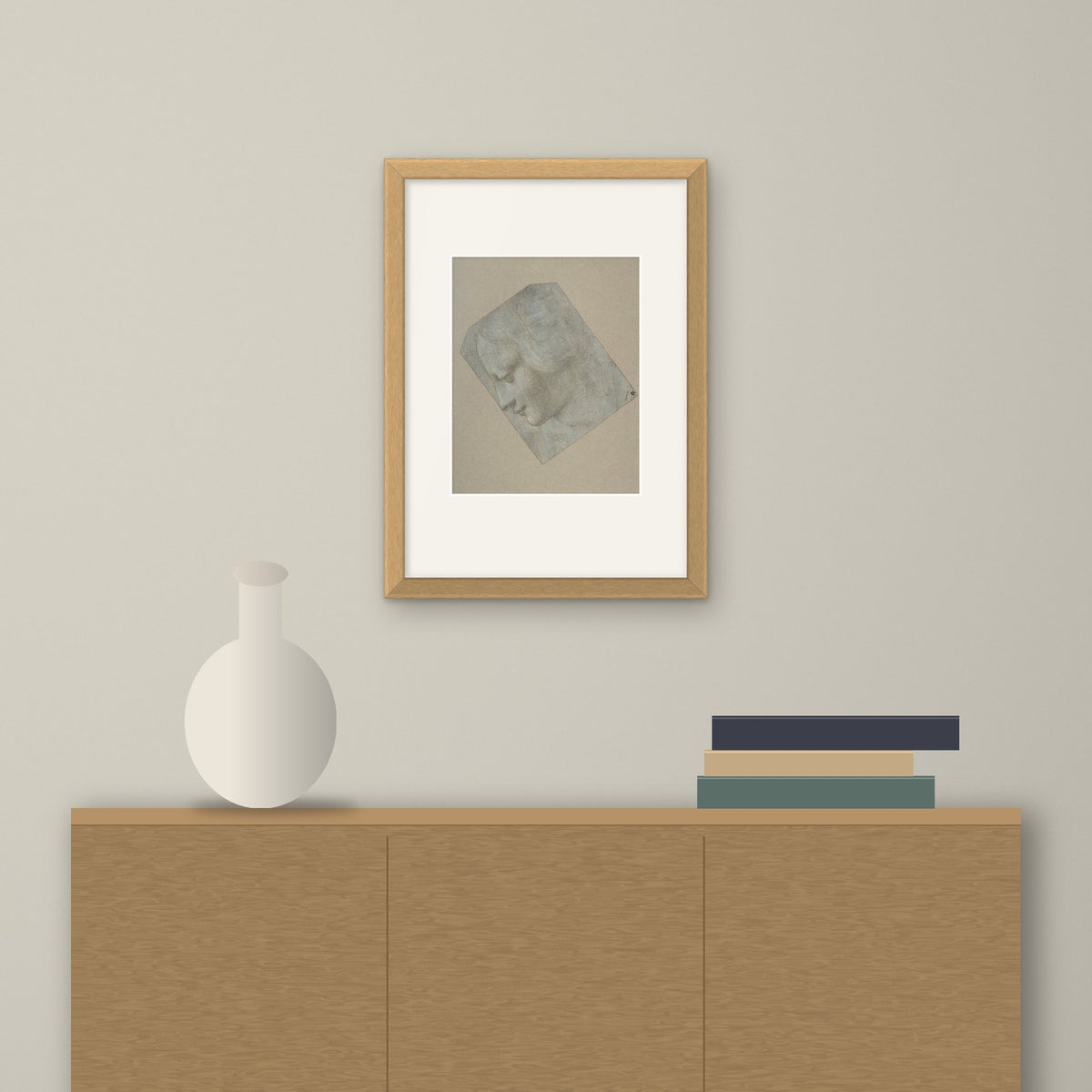 Head of a Woman in Profile – framed on a wall above a sideboard