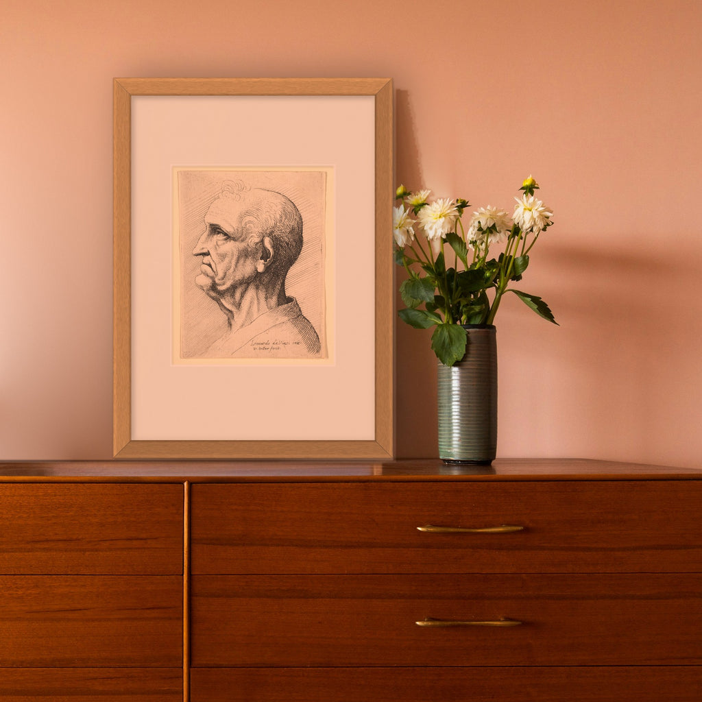 Head of an Old Man – framed in a living room