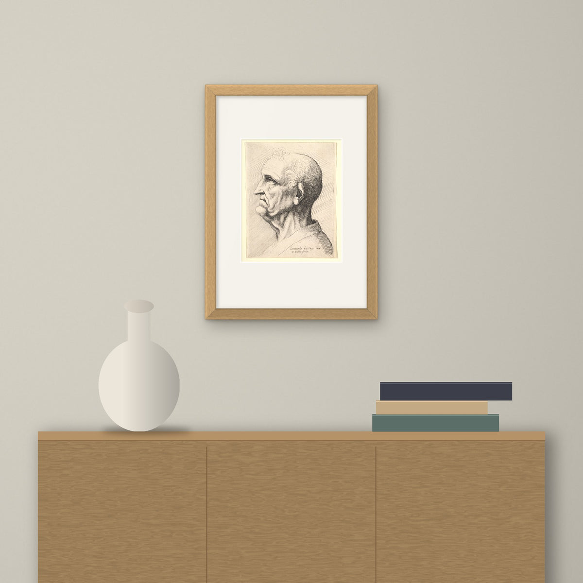Head of an Old Man – framed on a wall above a sideboard