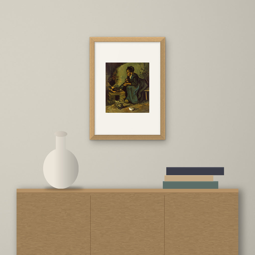 Peasant Woman Cooking by a Fireplace – framed on a wall above a sideboard