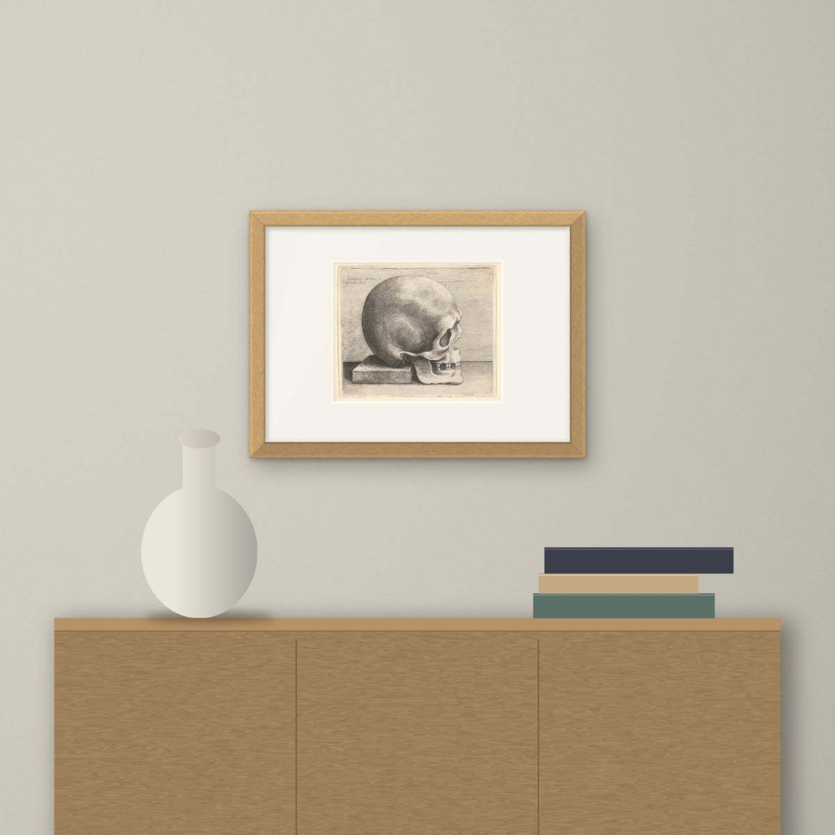 Skull in Profile – framed on a wall above a sideboard